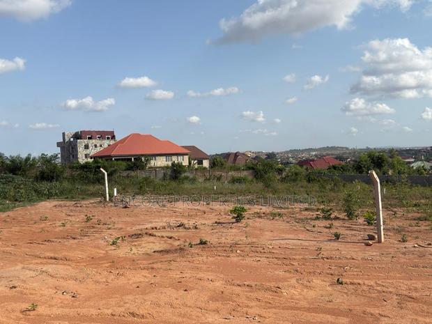 Acres of Titled Land in Oyibi Aya Court · Photo 4