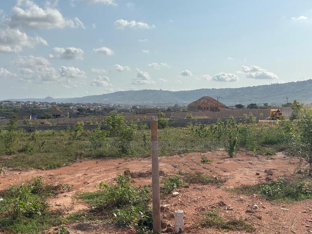Acres of Titled Land in Oyibi Aya Court · Photo 1