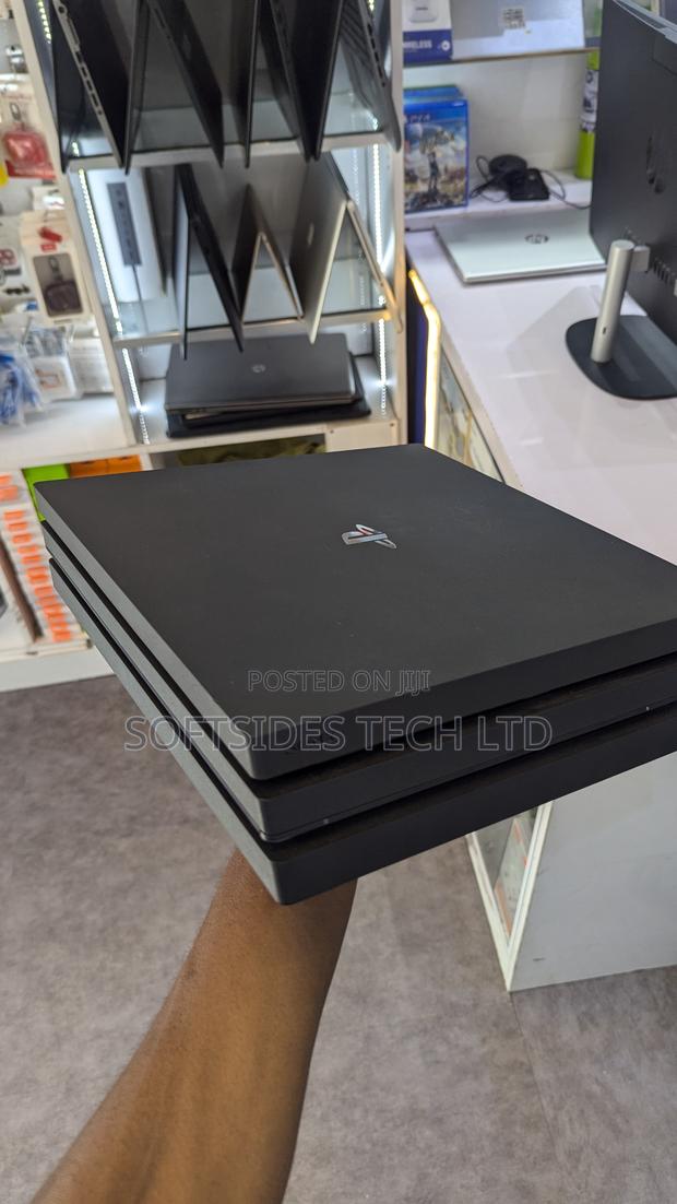Playstation 4 Pro Video Game Console From Home photo 3