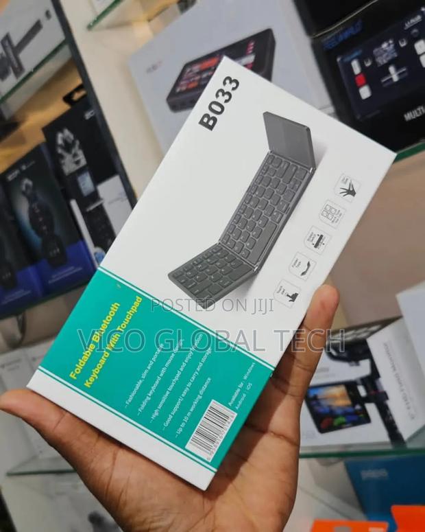 Foldable Bluetooth Keyboard With Touchpad · Photo 1