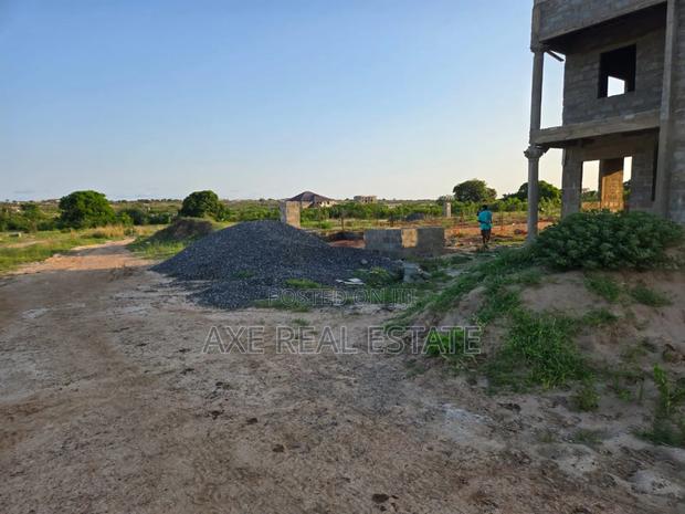 Neatly Demarcated Plus Pillars ! Plots at Prampram · Photo 3