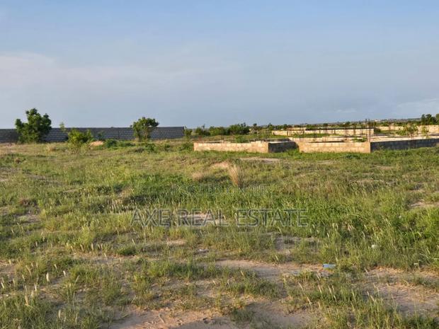 Neatly Demarcated Plus Pillars ! Plots at Prampram · Photo 4