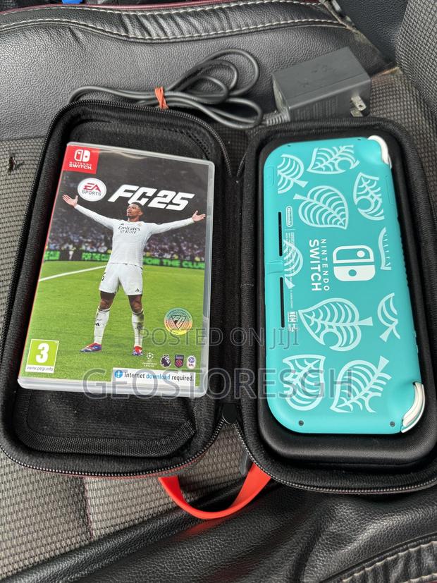 Nintendo Switch Lite With Fc 25 + Free Case photo 2