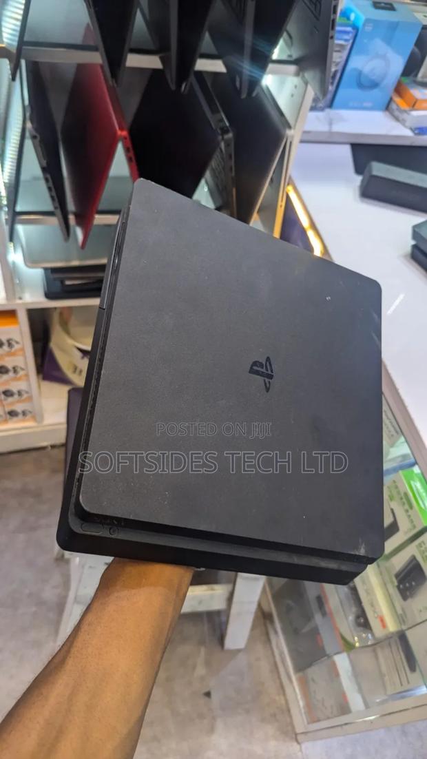 Playstation 4 Slim With Controller And 8 Games photo 3