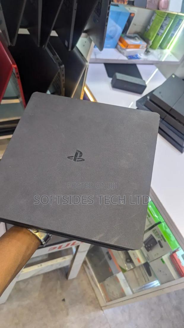 Very Neat Anti-scratch Playstation 4 Slim Home Used Console. photo 3