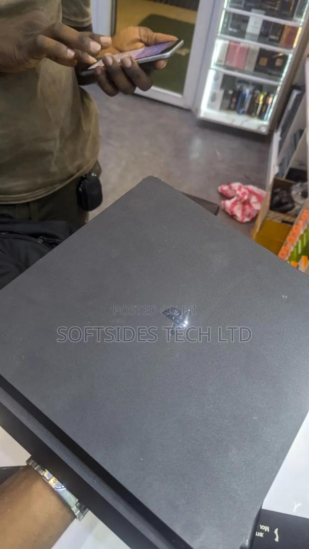 Nice Playstation 4 Slim Machine With 8 Games at Cool Price photo 2