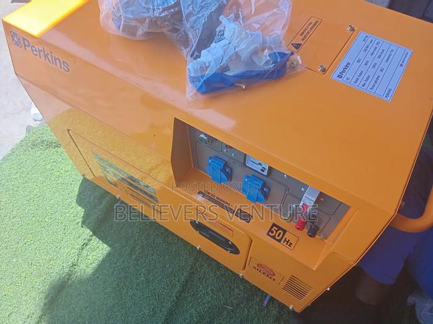 House and Three Phase Generator Yellow Perkins Generator · Photo 1