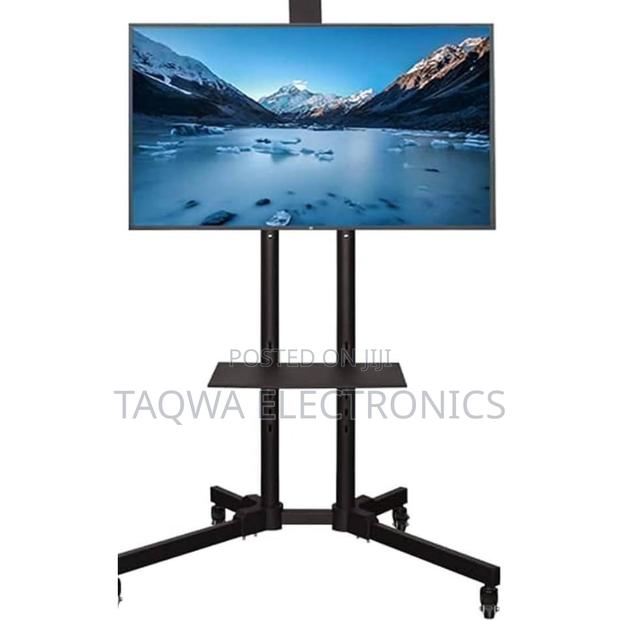 Moving// Tv Stand-32 to 70 Tv Stand · Photo 2