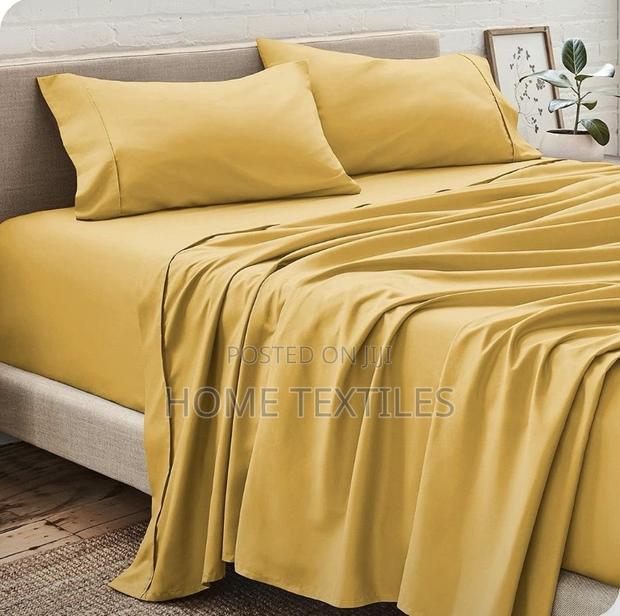 2 Yellow Bedsheet With 4 Pillow Cases · Photo 2