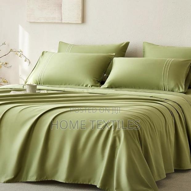 2 Green Bedsheet (Fitted and Flat Sheets) and 4 Pillow Cases · Photo 2