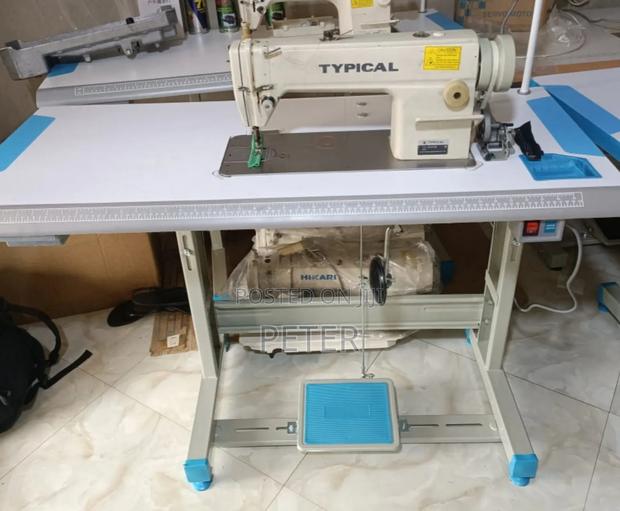 Typical Sewing Machine. In Kumasi Accra. · Photo 4