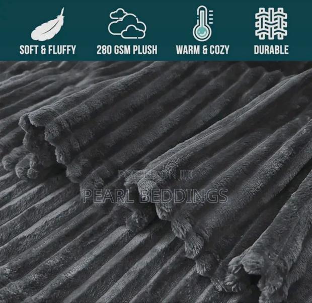 Quality Plush Throw Blanket Available In Different Colors · Photo 3