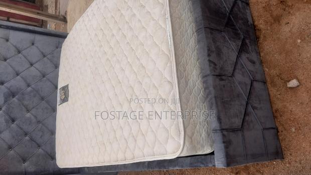 Gray Bed With Foreign Matress