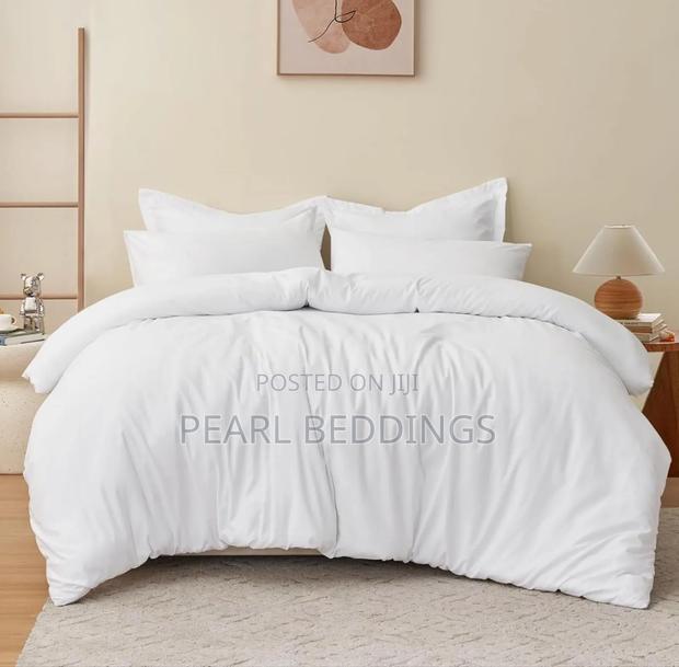 Luxurious 7pcs Cotton Duvet Available in Plain White · Photo 4