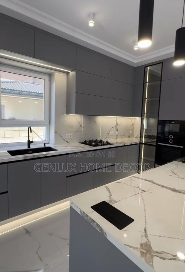 Luxury Kitchen Cabinets With Marble-Top Island · Photo 2