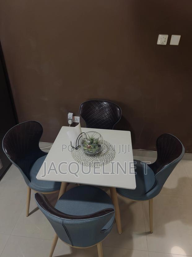 Used Dining Set (4 Chairs), Glass Top Table photo 2