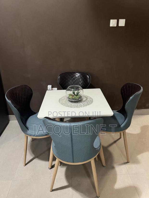 Used Dining Set (4 Chairs), Glass Top Table photo 3