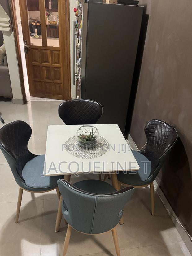 Used Dining Set (4 Chairs), Glass Top Table photo 4