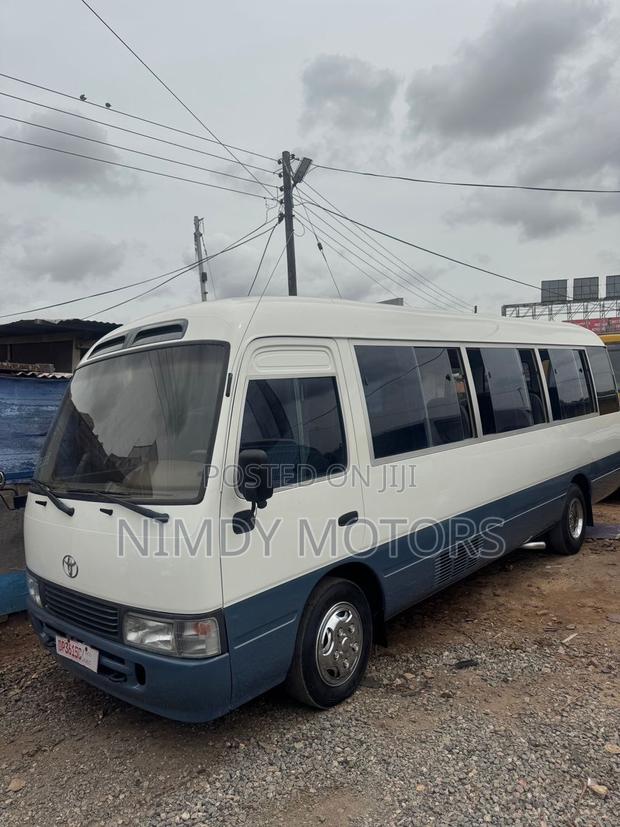 Toyota Coaster 2010 White photo 2