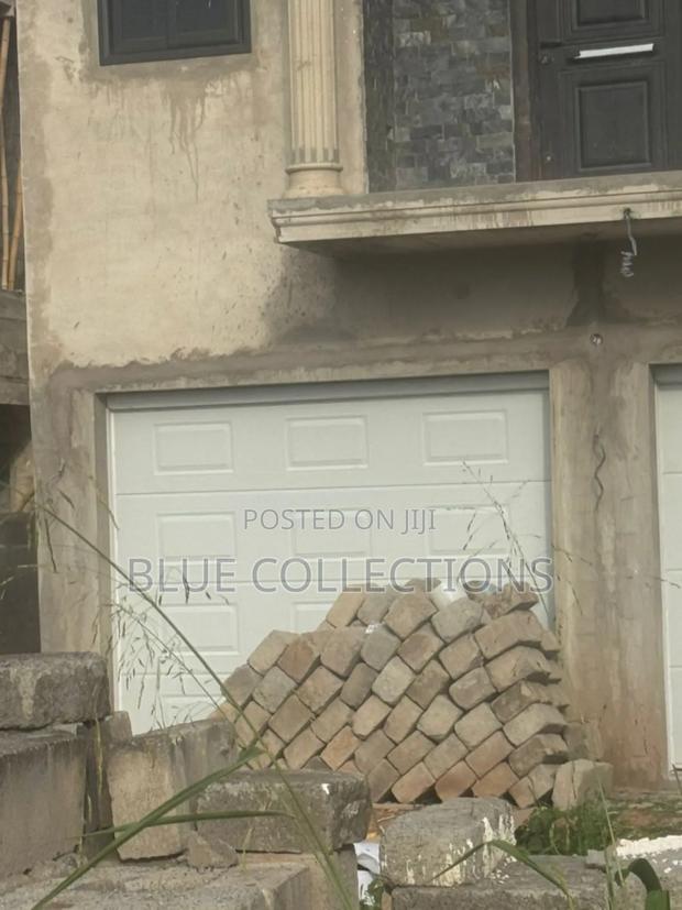Double Automated Garage Door · Photo 3