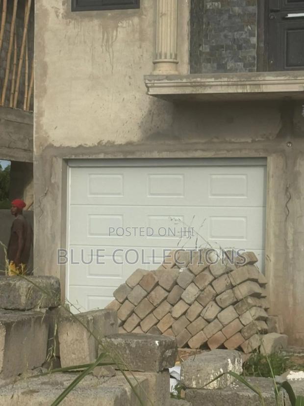 Double Automated Garage Door · Photo 4
