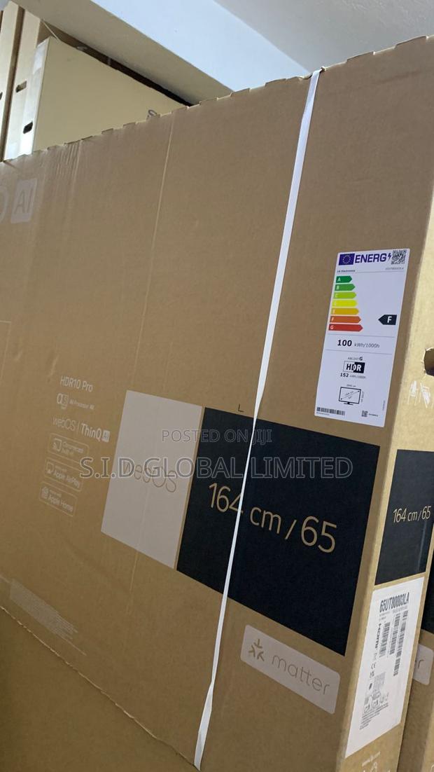 Lg Magic Ai Remote 65" Tv Ut6580 · Photo 3