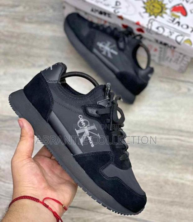 Authentic Calvin Klein Black Sneaker · Photo 3
