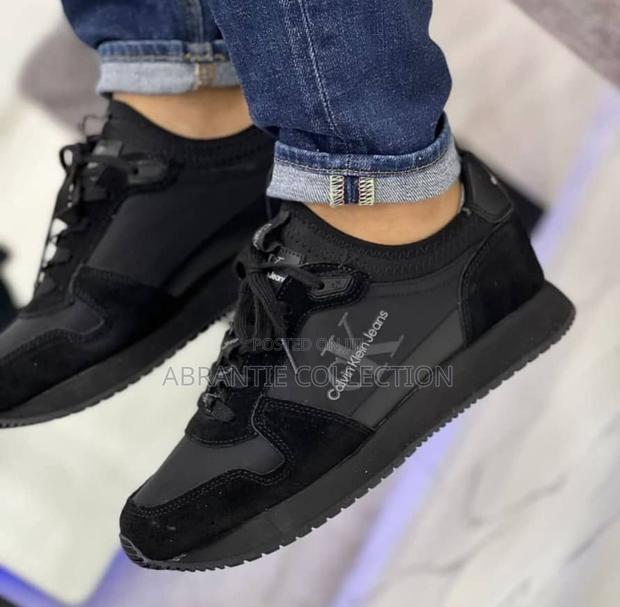 Authentic Calvin Klein Black Sneaker · Photo 4