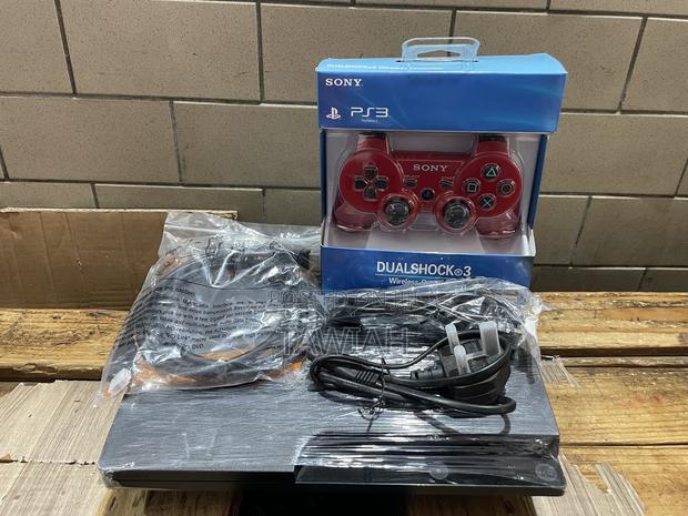 Ps3 Console With Games · Photo 2