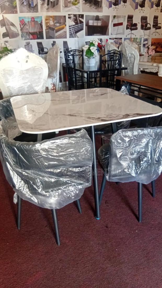 Marble Dining With Four Chairs