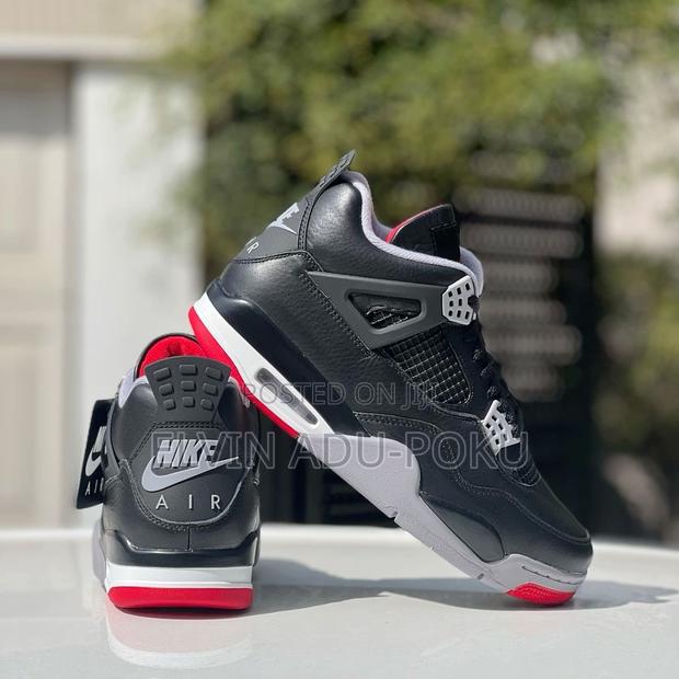 Air Jordan 4 "Bred Reimagined" Sneakers. · Photo 3