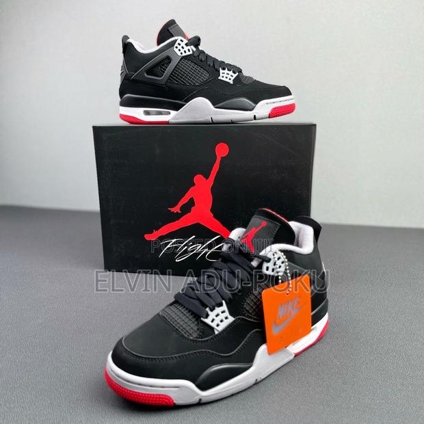 Air Jordan 4 "Bred Reimagined" Sneakers. · Photo 4