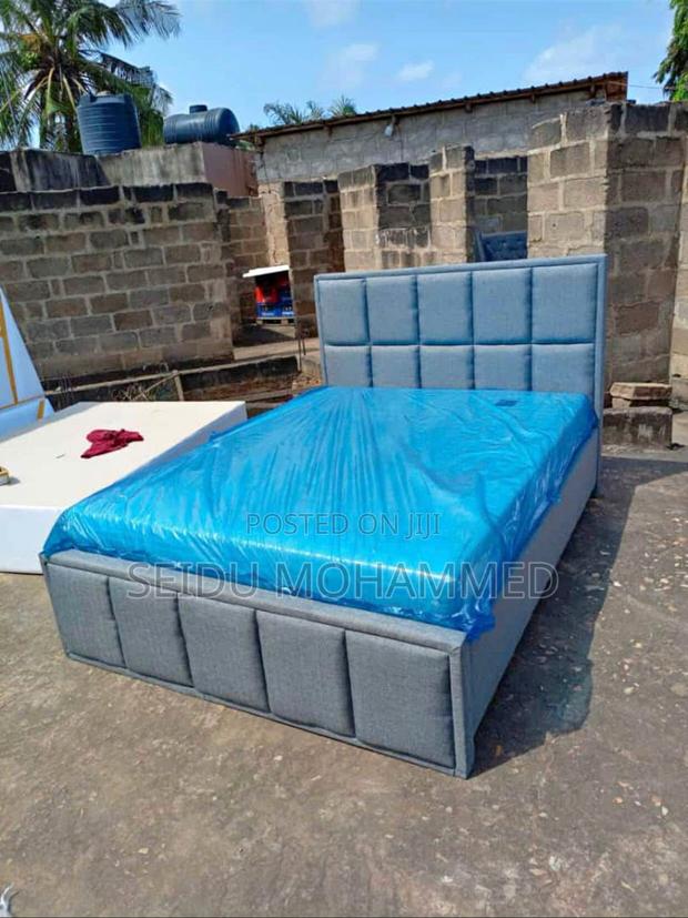 A Design Bed Frame With Mattress · Photo 2