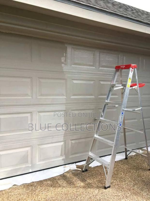 Smart Garage Door With Fanlight · Photo 3