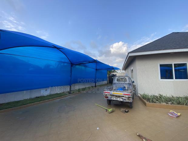 Usual Carport photo 3