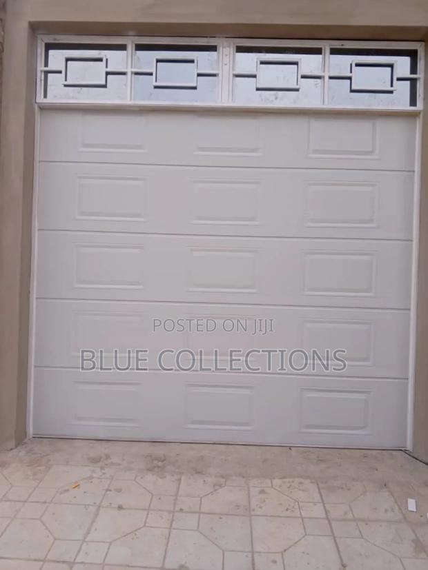 Automated Garage Door With Fanlight