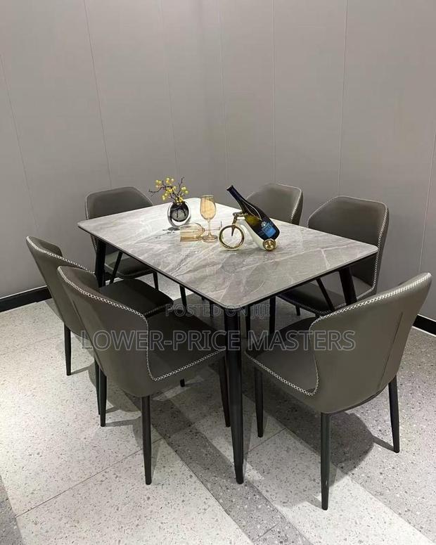 Exclusive 6 Chair Marble Dining Set