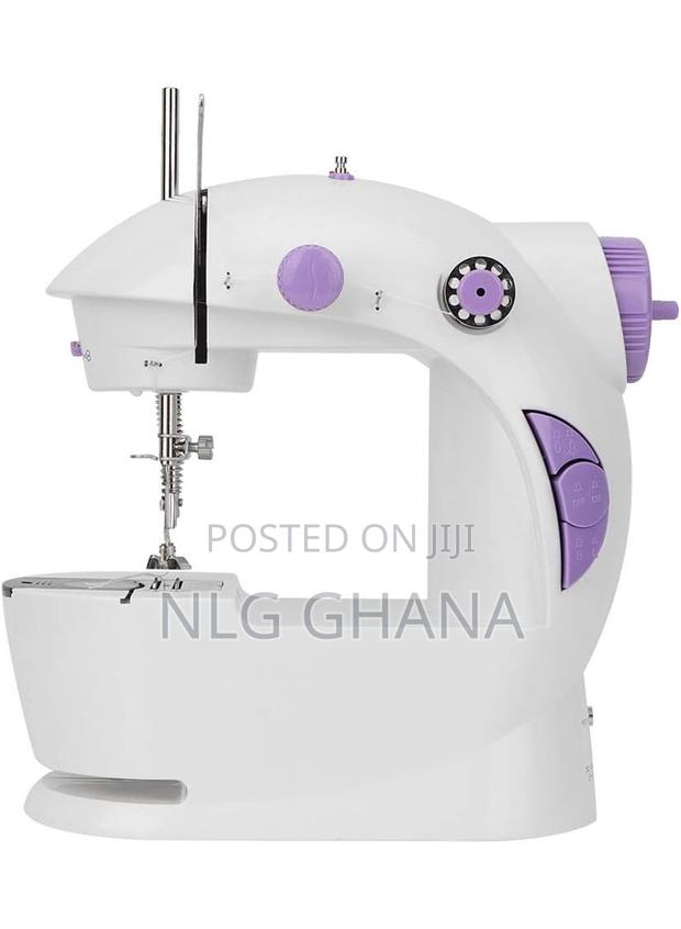 Portable Electric Mini Sewing Machine. Ghx2970 · Photo 1
