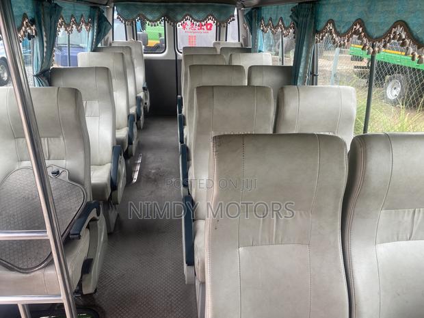 Toyota Coaster 2015 Beige photo 5