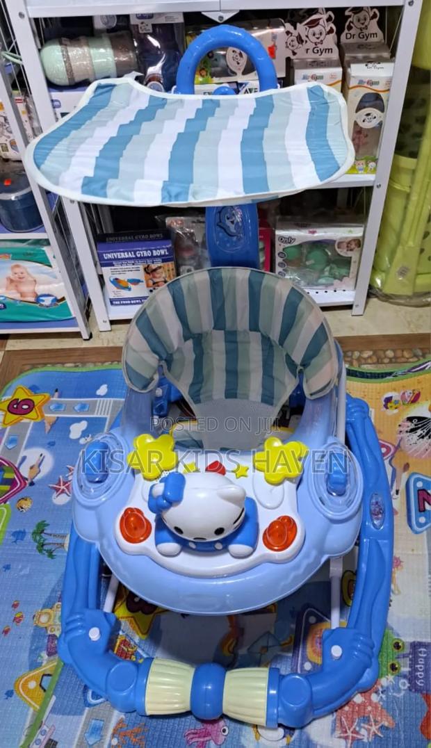 Fashion Baby Walker With Music, Foot Mat, and Umbrella · Photo 4