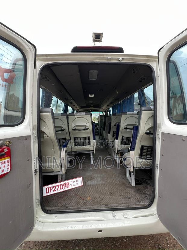 Toyota Coaster 2013 White photo 5