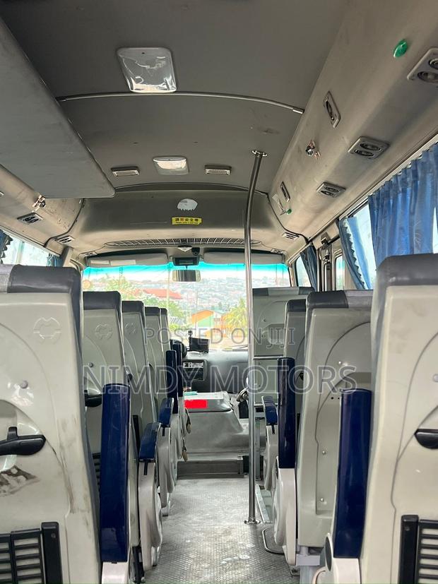 Toyota Coaster 2013 White photo 6