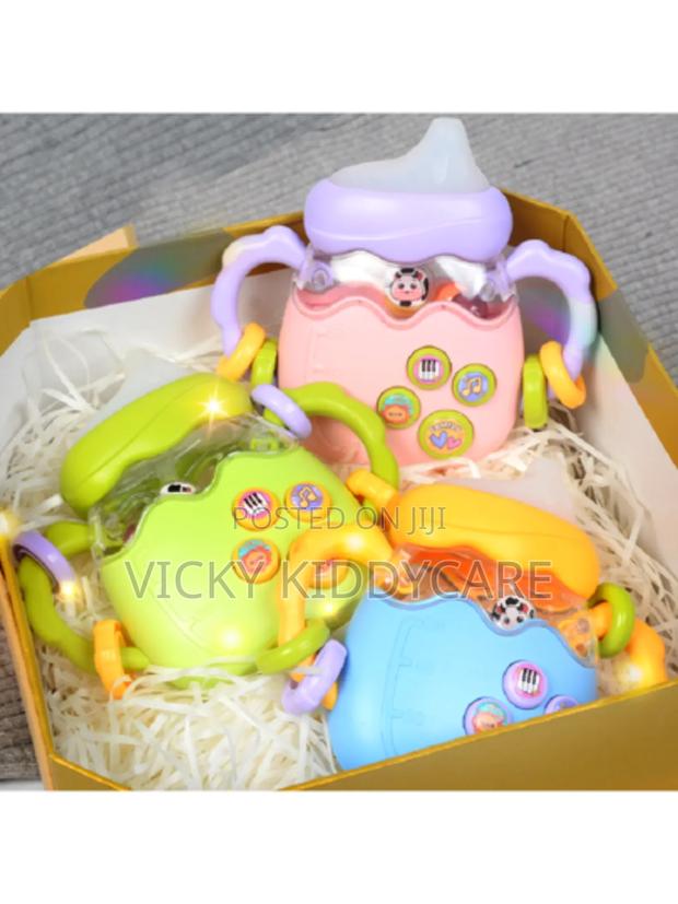 Interactive Musical Electric Rattle Silicone Feeding Bottle · Photo 3