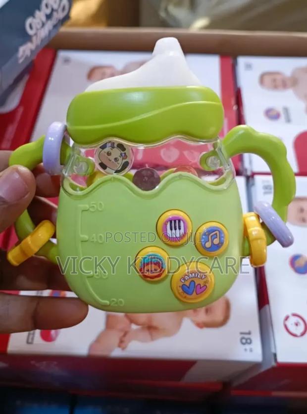 Interactive Musical Electric Rattle Silicone Feeding Bottle · Photo 4