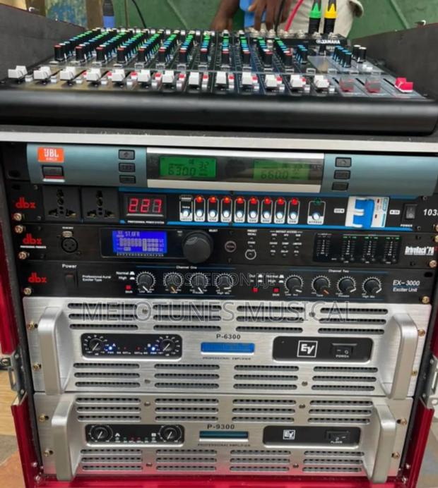 Full Set of Amplifiers in Rack With Mixer Cabling · Photo 3