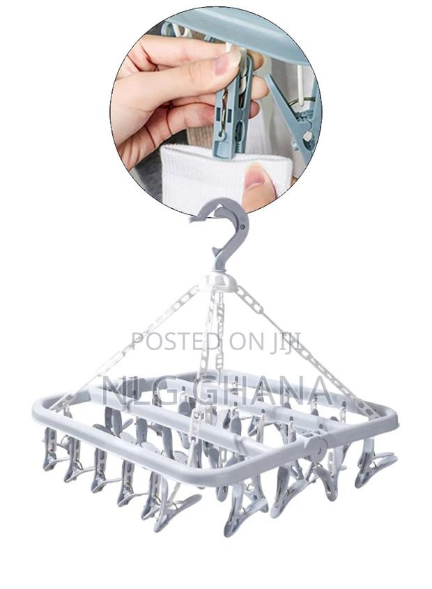 32 Clips Foldable Hanging Drying Rack. · Photo 1