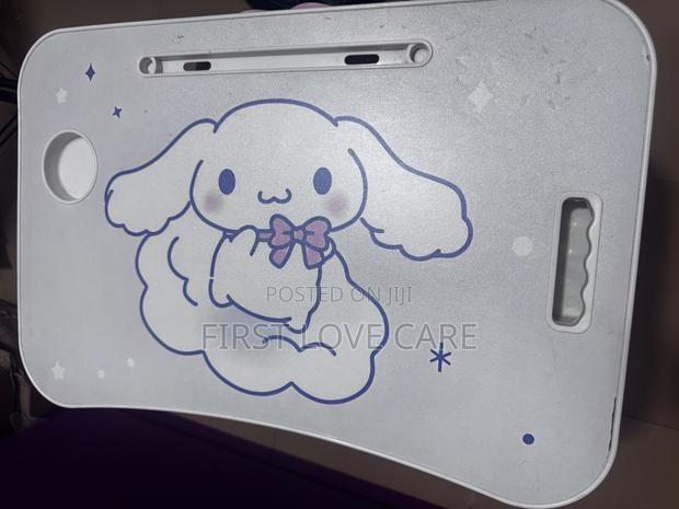 Laptop Table With Character Available In Stock photo 4