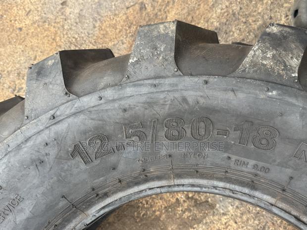 12.5/80r18 Backhoe photo 3