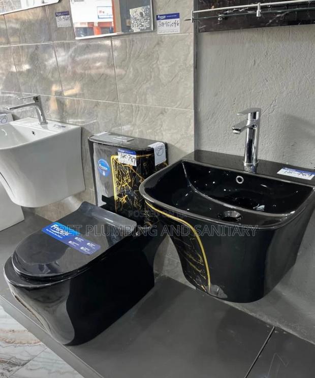 Black and Gold Water Closet (Wc)With Combined Hand Wash Basin · Photo 2