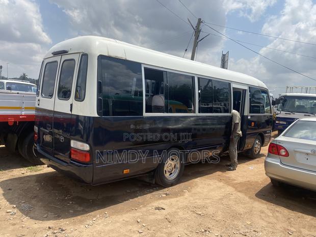 Toyota Coaster 2015 Black photo 4